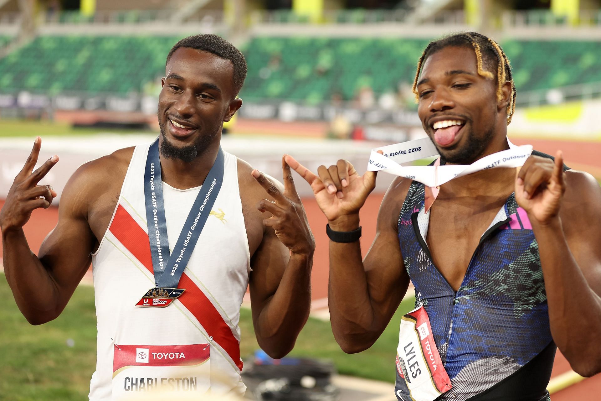 Noah Lyles and Christian Charleston after winning in the men&#039;s 100m final at the 2023 USATF Outdoor Championships in Eugene, Oregon