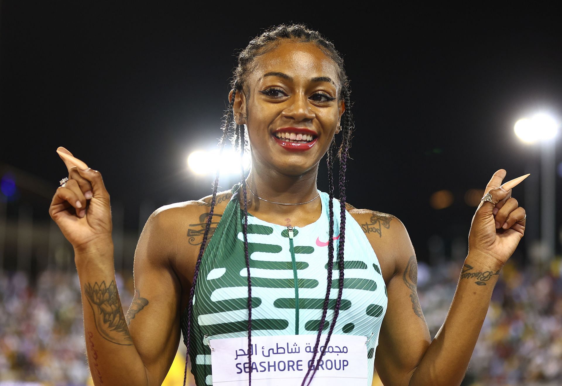 Sha&#039;Carri Richardson celebrates after winning the women&#039;s 100m in Diamond League 2023 meeting at the Khalifa International Stadium in Doha, Qatar