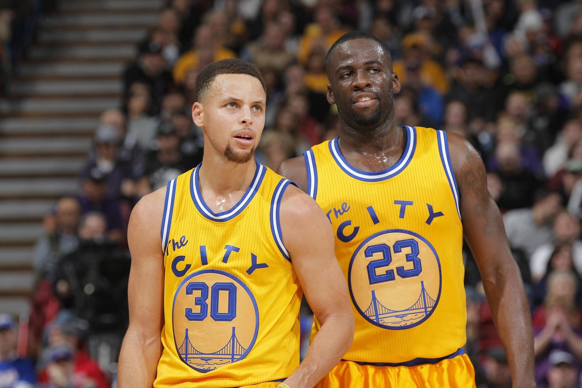 Golden State Warriors teammates Steph Curry and Draymond Green