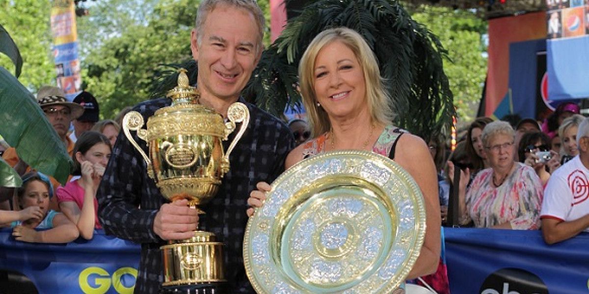 John McEnroe and Chris Evert with their Wimbledon trophies