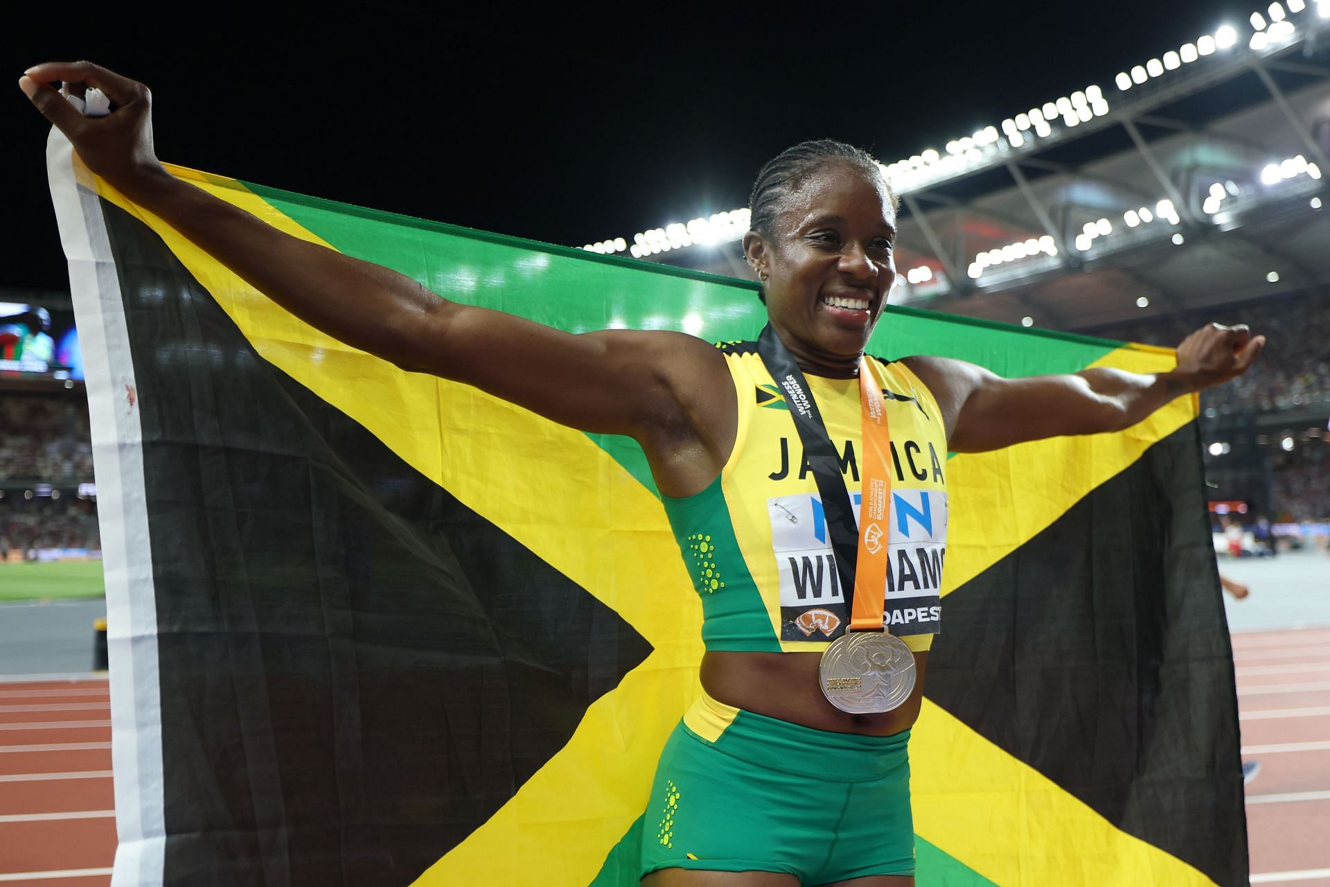 Danielle Williams of Team Jamaica celebrates winning the Women's 100m Hurdles Final during Day 6 of the World Athletics Championships Budapest 2023