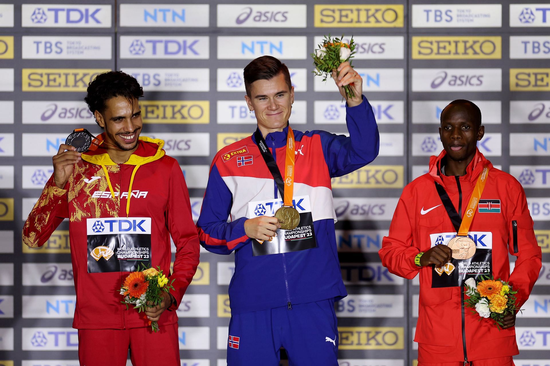Silver medalist Mohamed Katir of Team Spain, gold medalist Jakob Ingebrigtsen of Team Norway, and bronze medalist Jacob Krop of Team Kenya during Day 9 of the 2023 World Athletics Championships 