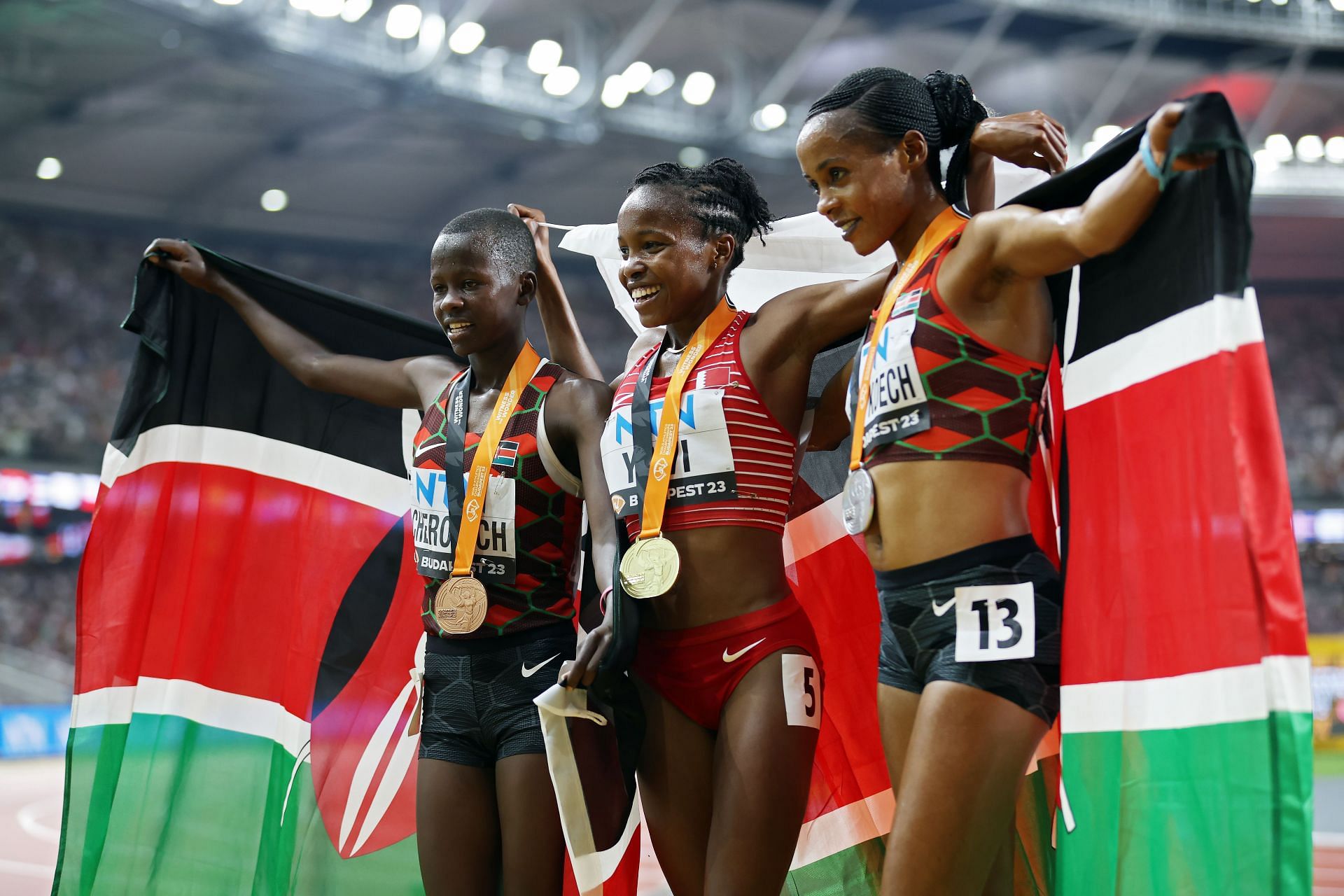 Bronze medalist Faith Cherotich of Team Kenya, gold medalist Winfred Mutile Yavi of Team Bahrain and silver medalist Beatrice Chepkoech of Team Kenya during Day 9 of the 2023 World Athletics Championships 