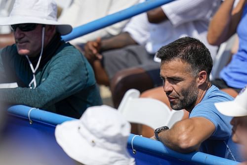 Pere Riba in the stands during the Gauff vs Sakkari final matchup at the Citi Open