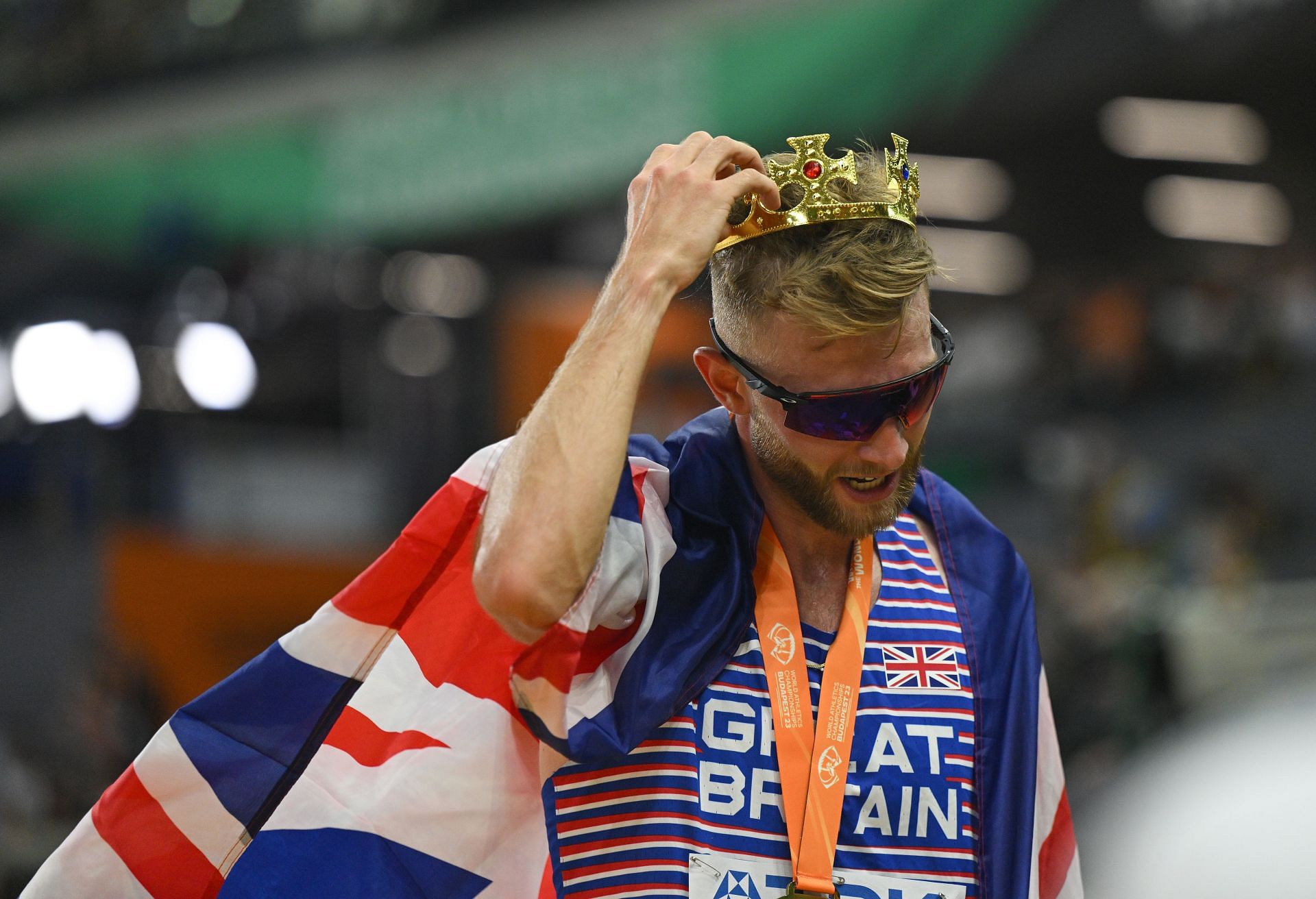 Josh Kerr celebrates after winning a gold medal in the Men&#039;s 1500m at the 2023 World Athletics Championships in Budapest