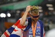 Josh Kerr celebrates after winning a gold medal in the Men's 1500m at the 2023 World Athletics Championships in Budapest