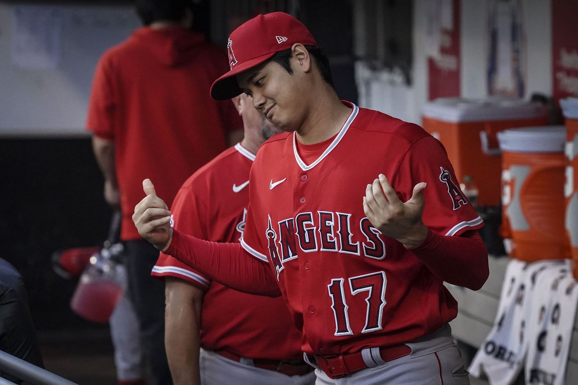 Los Angeles Angels designated hitter Shohei Ohtani arrives in the dugout before the start of a baseball game against the New York Mets