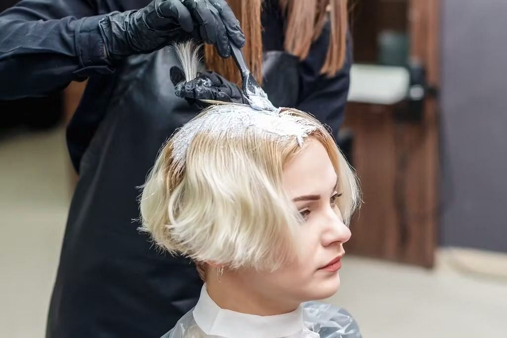 Bleach on hair (Image via Getty Images)