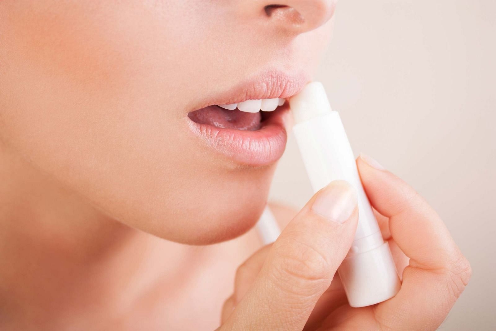 Lip balm - skincare essential (Image via Getty Images)