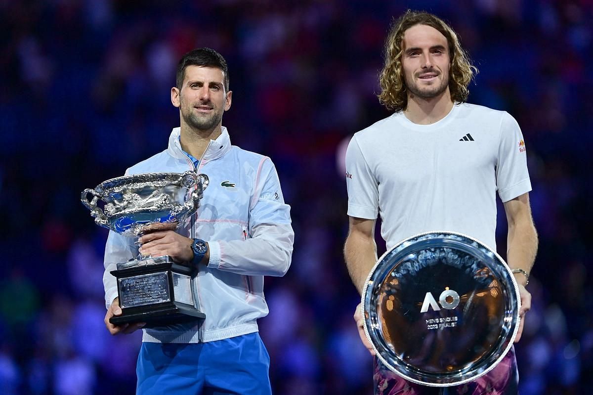Stefanos Tsitsipas poses with the runner-up trophy at the 2023 Australian Open