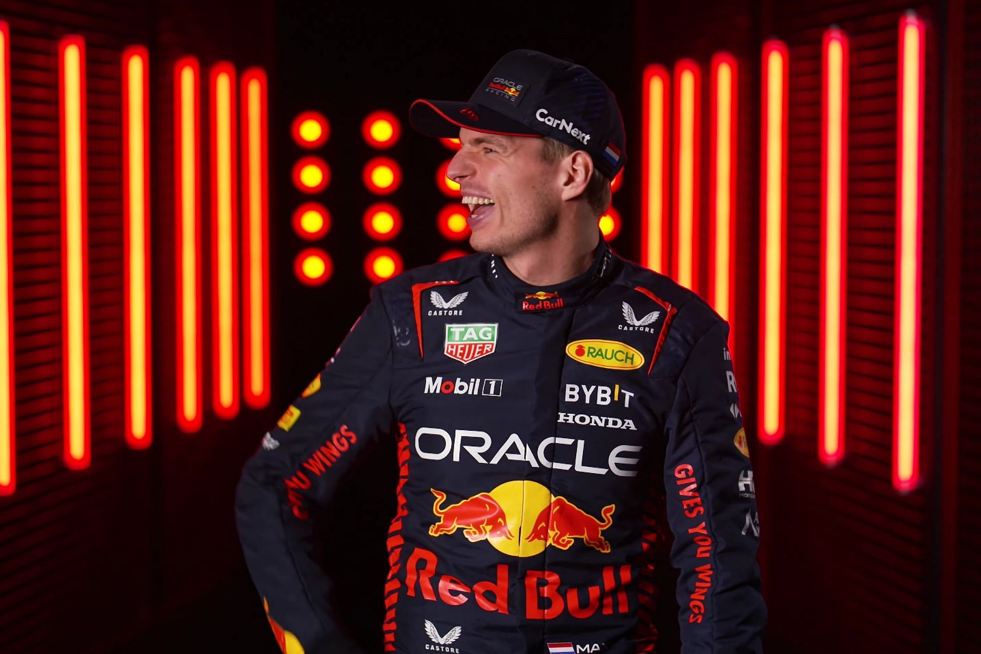 Max Verstappen laughing during the fourth episode of Grill The Grid (Image via YouTube/FORMULA 1)