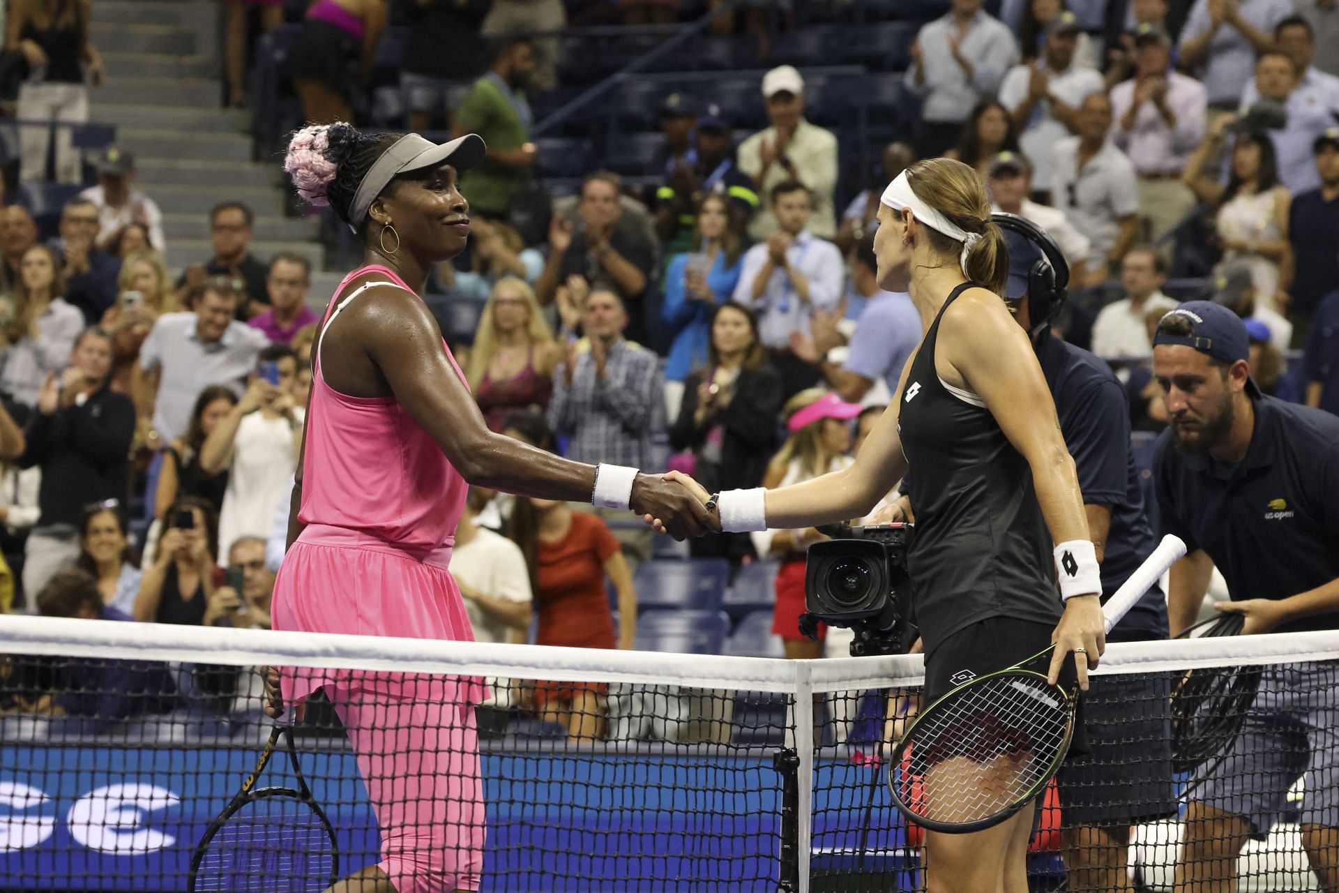 Venus Williams and Greet Minnen shake hands after their first-round clash at the 2023 US Open.