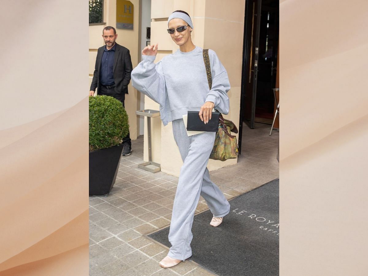 Bella Hadid chose a matching pullover as street fashion (Image via Getty)