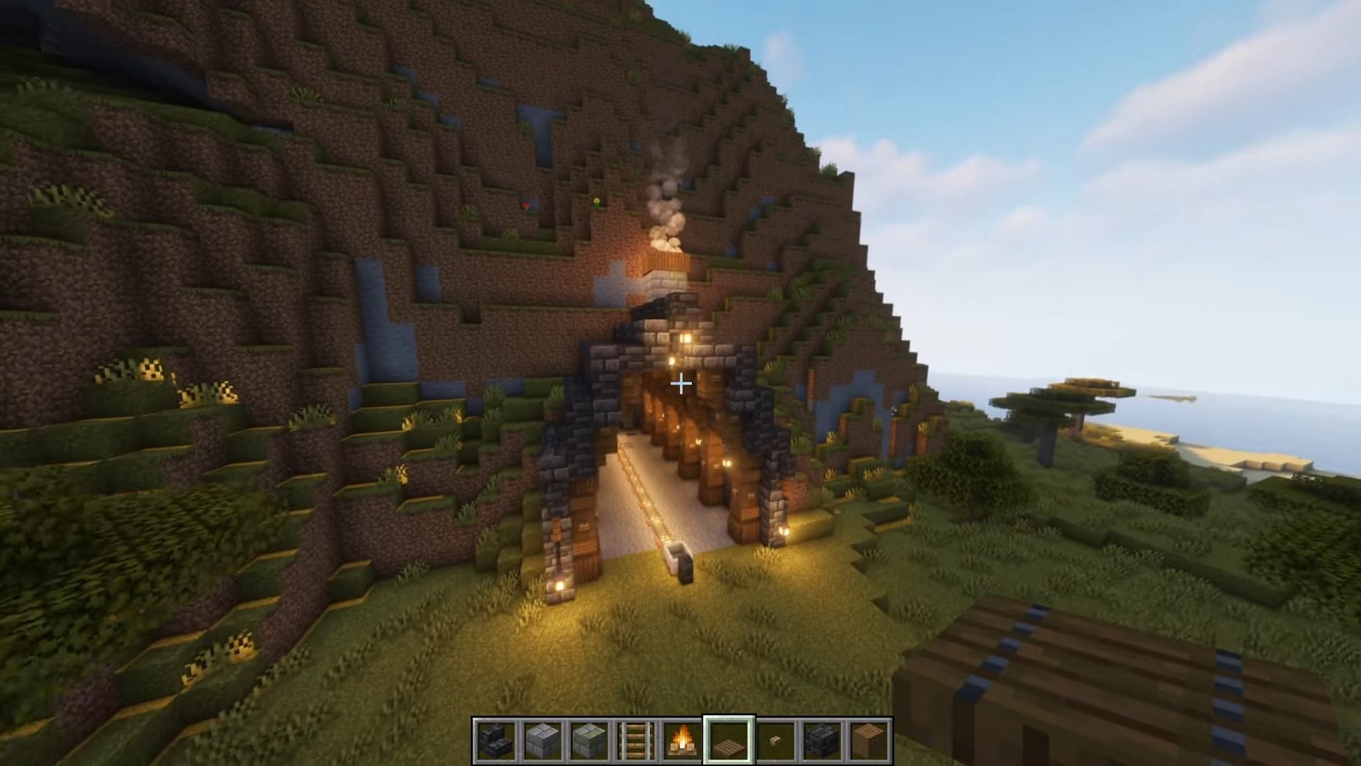 Mountains in Minecraft make for natural mine entrances in every sense (Image via WaxFraud/YouTube)