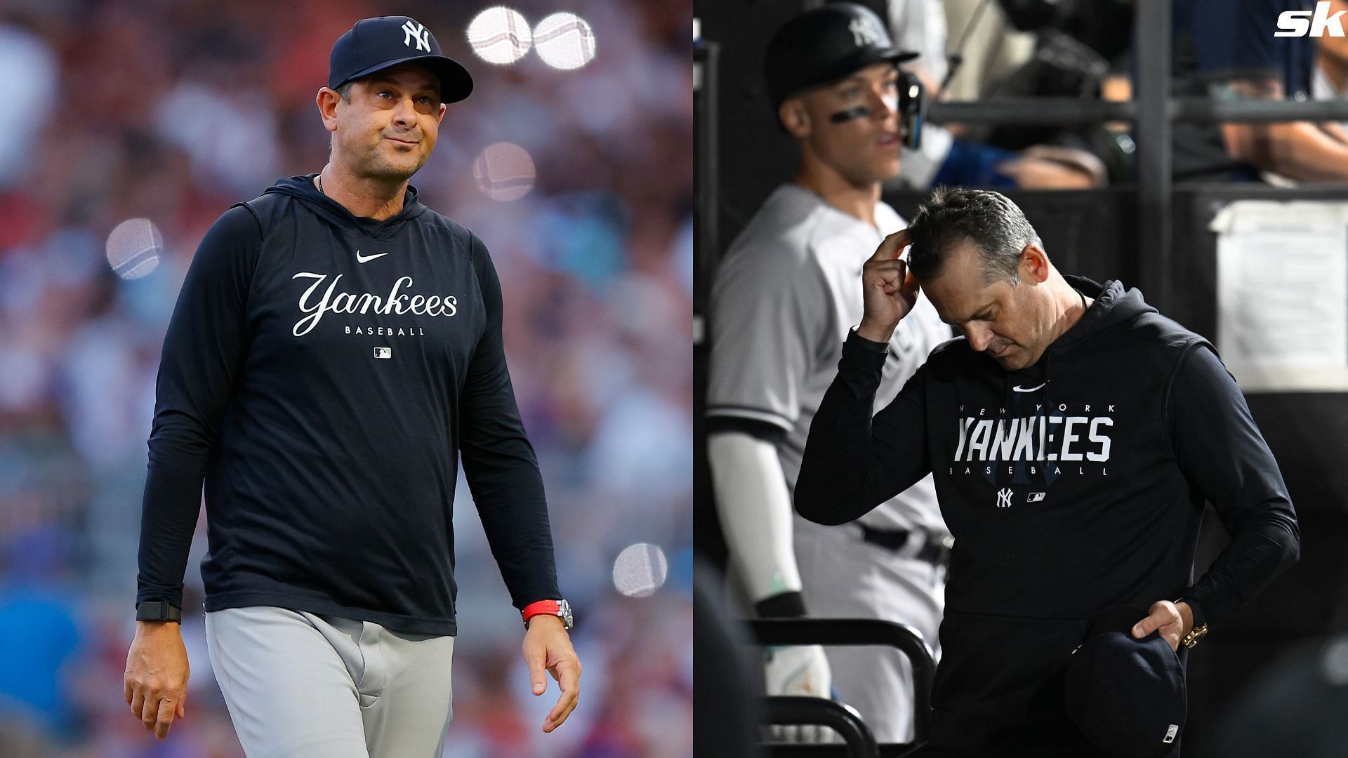 Manager Aaron Boone of the New York Yankees makes a pitching change against the Atlanta Braves at Truist Park