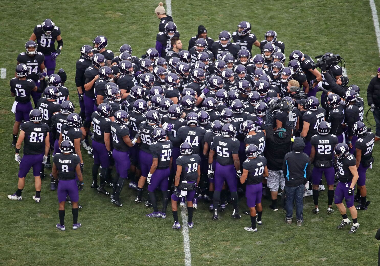 Northwestern football team wears 'Cats against the world' shirts