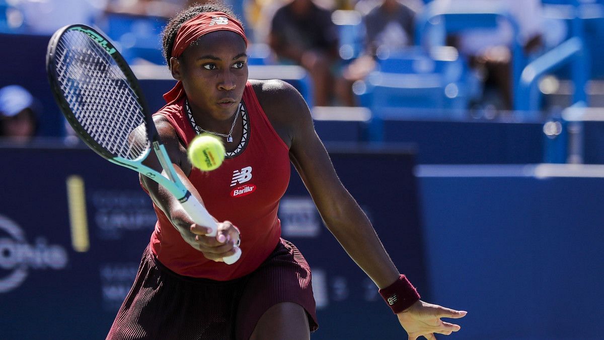 Coco Gauff retrives a ball at the WTA 1000 event in Cincinnati