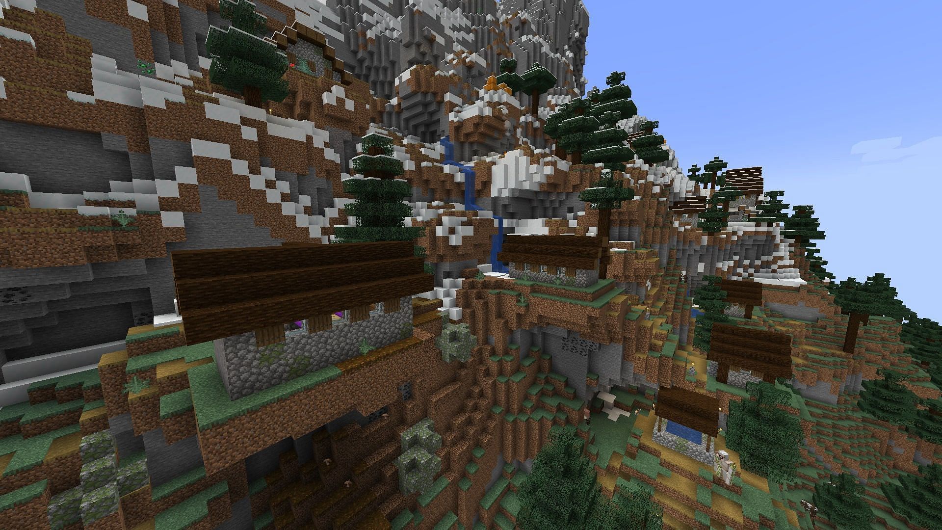 Taiga village spawning on the foothills of a humongous mountain (Image via Minecraft)