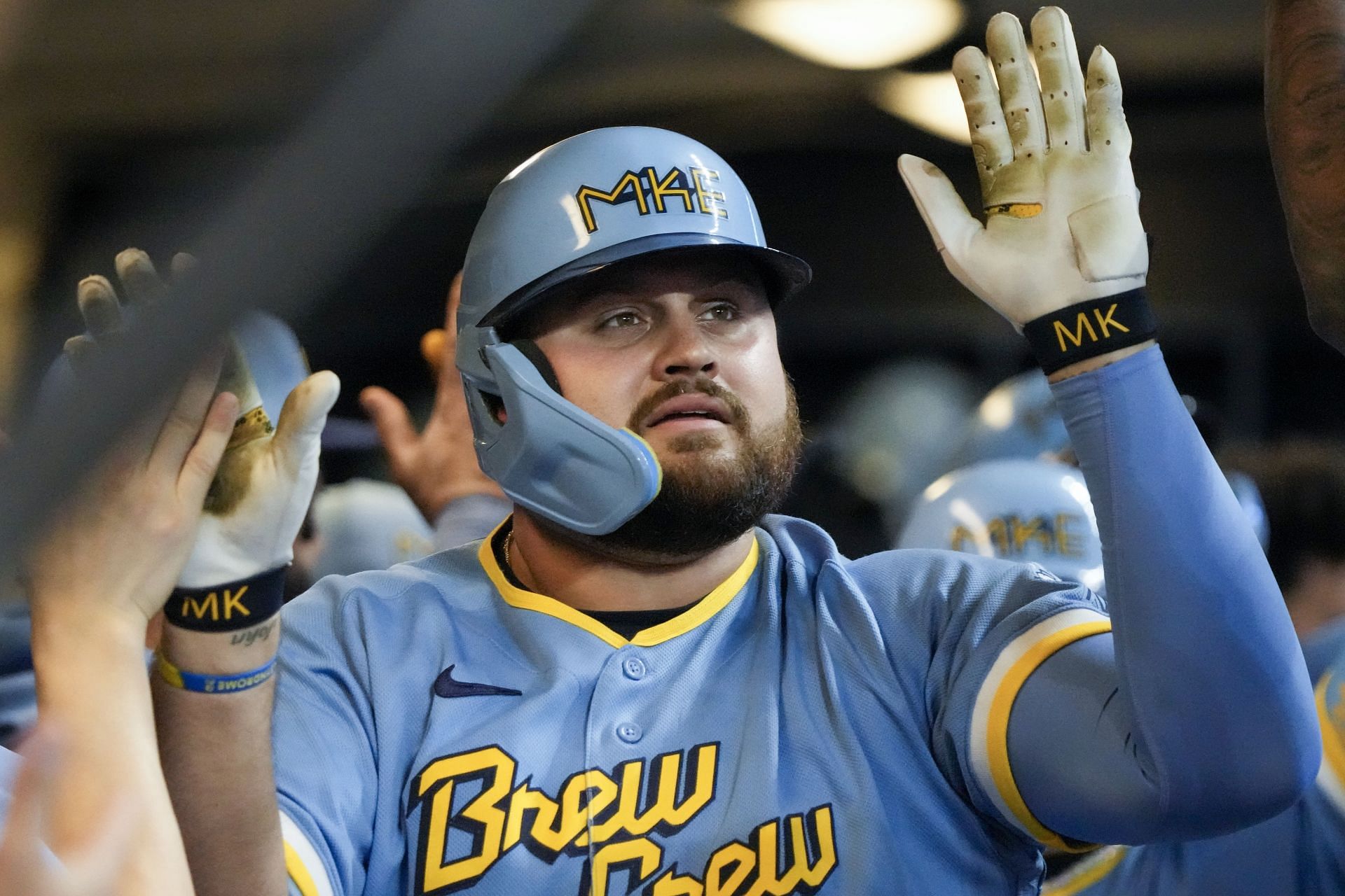 Milwaukee Brewers&#039; Rowdy Tellez is congratulated after hitting a three-run home run against the San Diego Padres