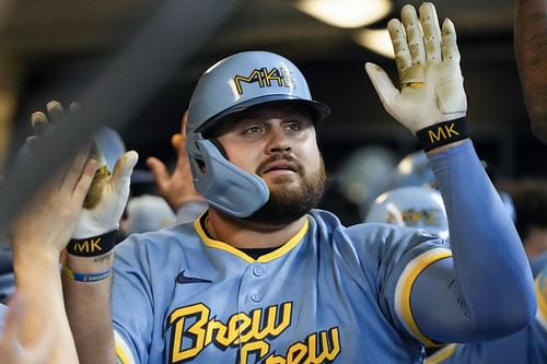 Milwaukee Brewers' Rowdy Tellez is congratulated after hitting a three-run home run against the San Diego Padres