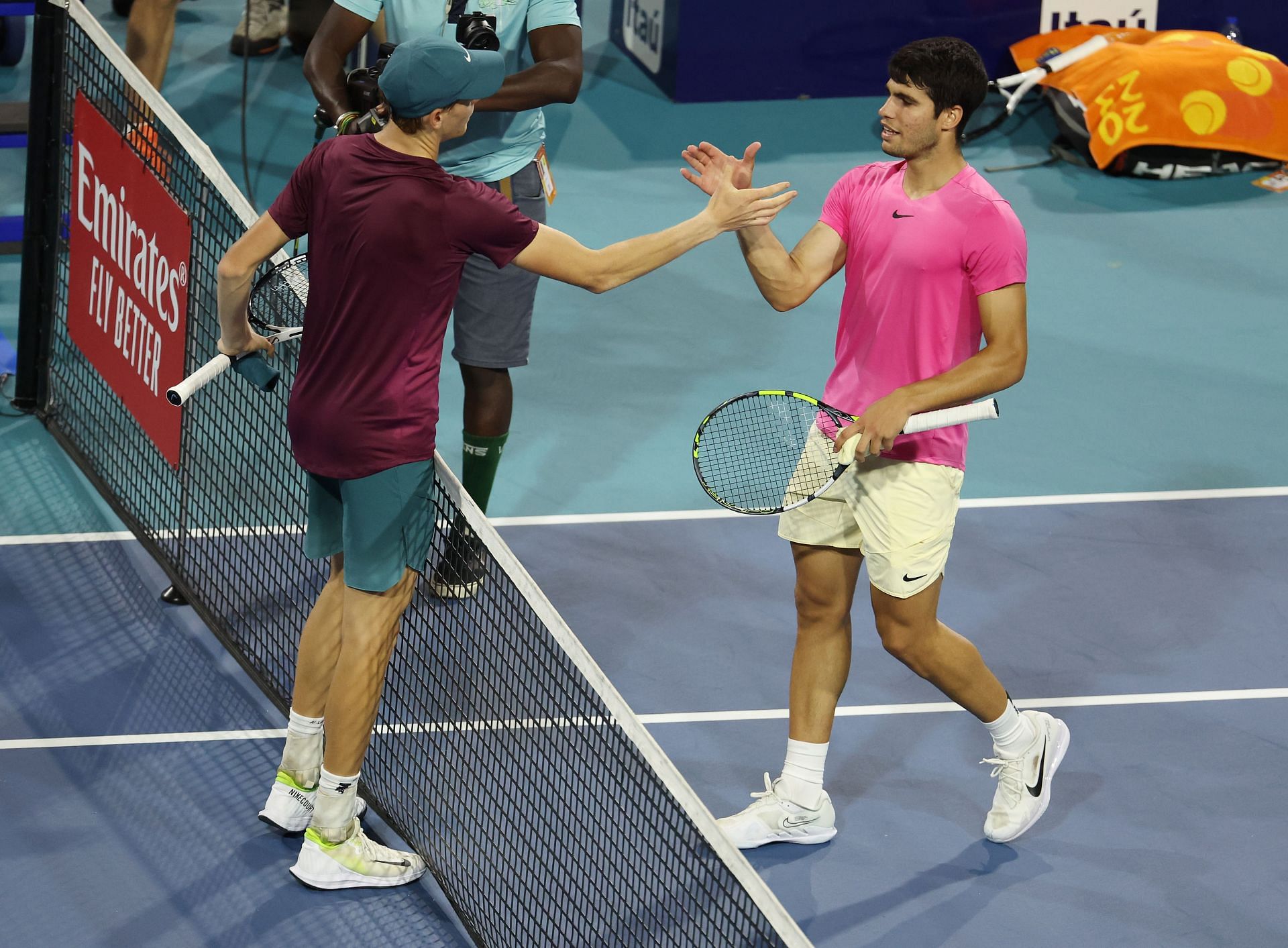Jannik Sinner and Carlos Alcaraz shake hands with each other after their 2023 Miami Open matchup