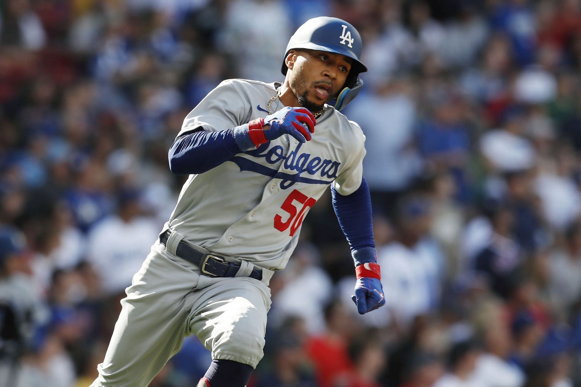 Los Angeles Dodgers&#039; Mookie Betts runs on his double during the first inning of a baseball game against the Boston Red Sox