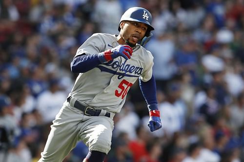 Los Angeles Dodgers' Mookie Betts runs on his double during the first inning of a baseball game against the Boston Red Sox