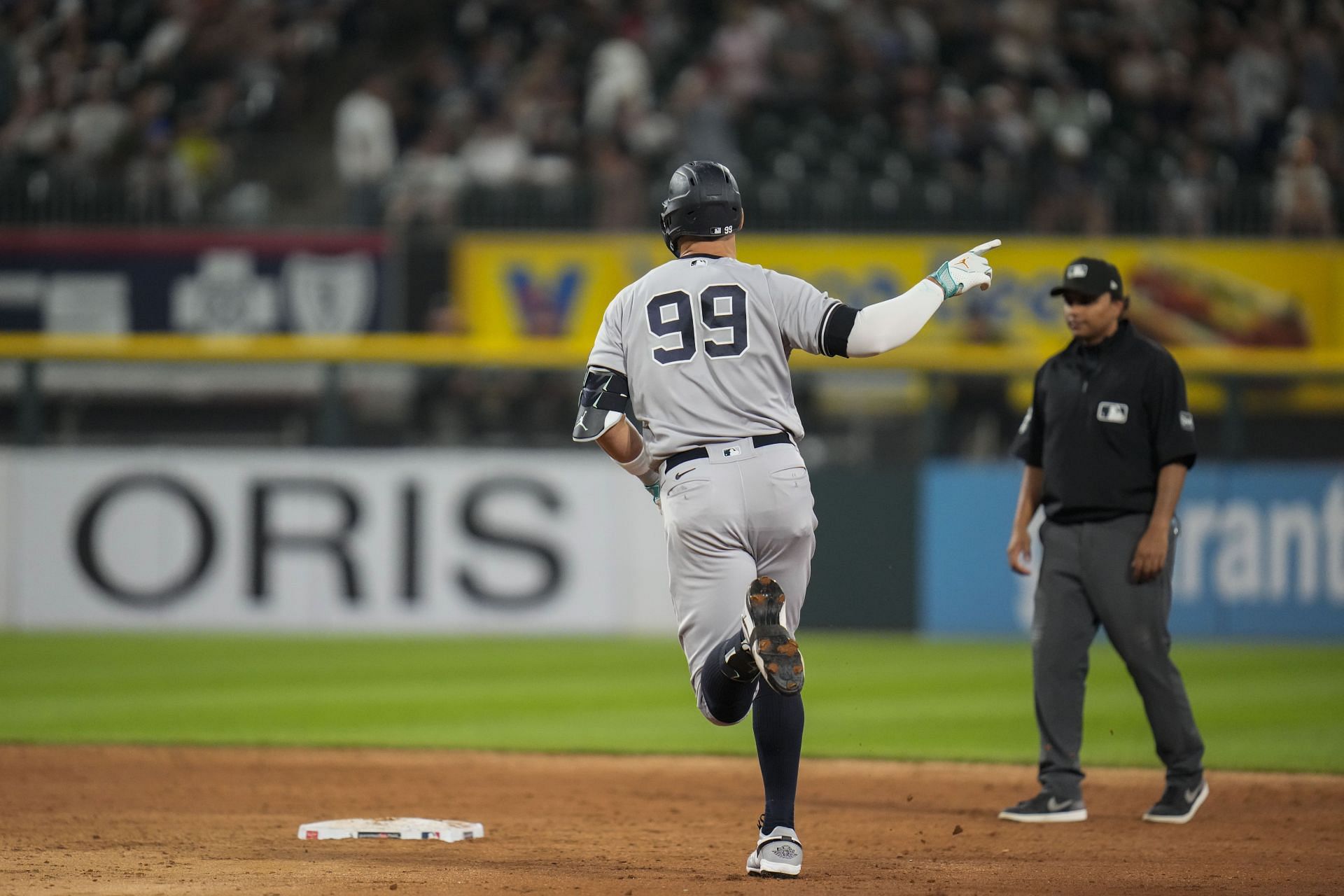 New York Yankees&#039; Aaron Judge runs the bases after hitting a home run against the Chicago White Sox