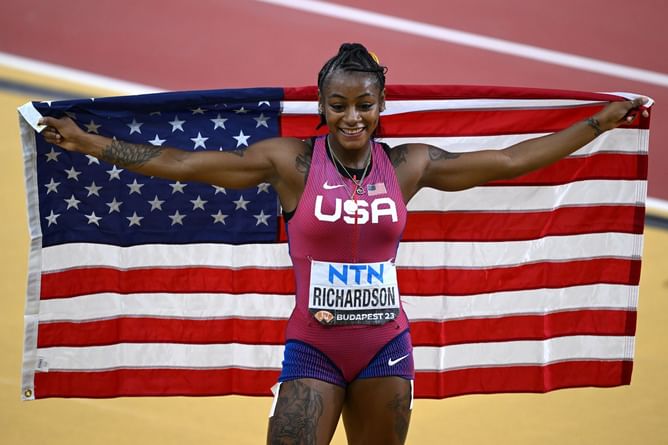 Sha'Carri Richardson is overcome with emotions after setting World Athletics Championships record en route to 100m gold in Budapest