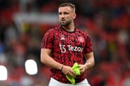 Luke Shaw of Manchester United looks on