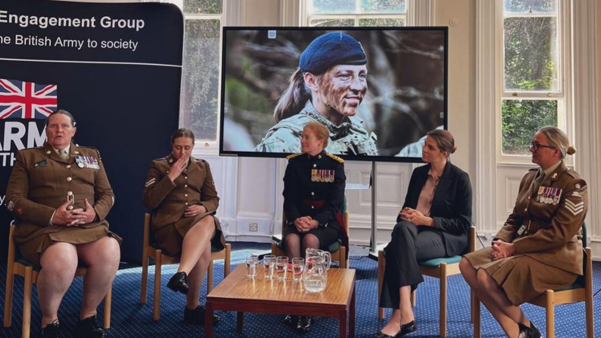 Picture of Deborah Penny participating in a discussion at Sandhurst Military Academy. (Photo via @Tub_Thumperz/Twitter)