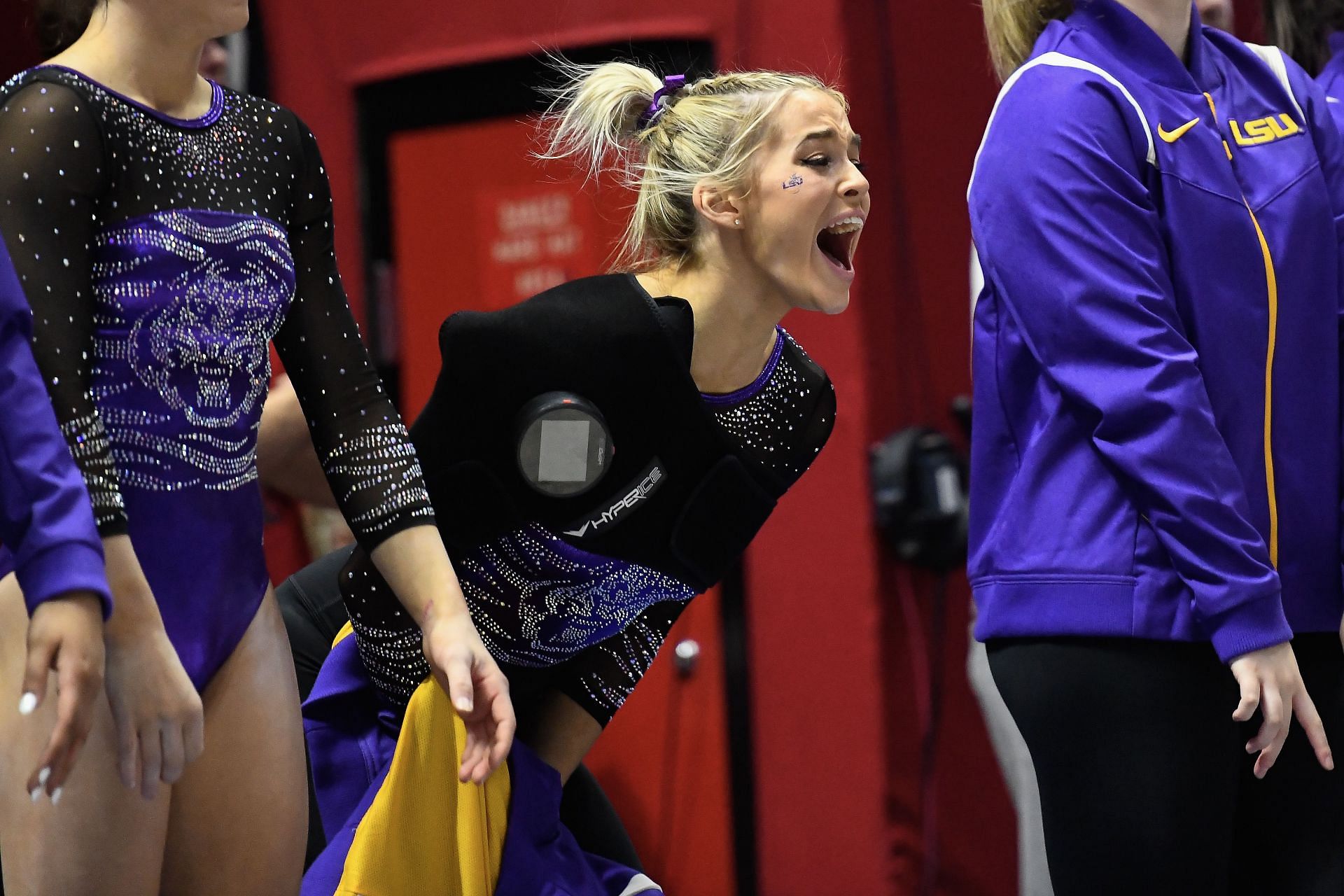 Olivia Dunne cheers for her teammates during the PAC -12 meet against Utah at Jon M. Huntsman Center in Salt Lake City, Utah