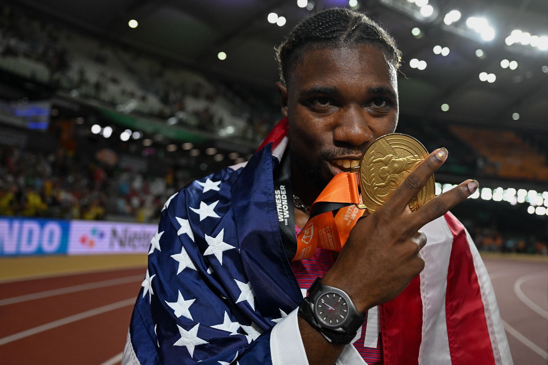 Noah Lyles celebrates after winning the men&#039;s 200m at the 2023 World Athletics Championships in Budapest, Hungary