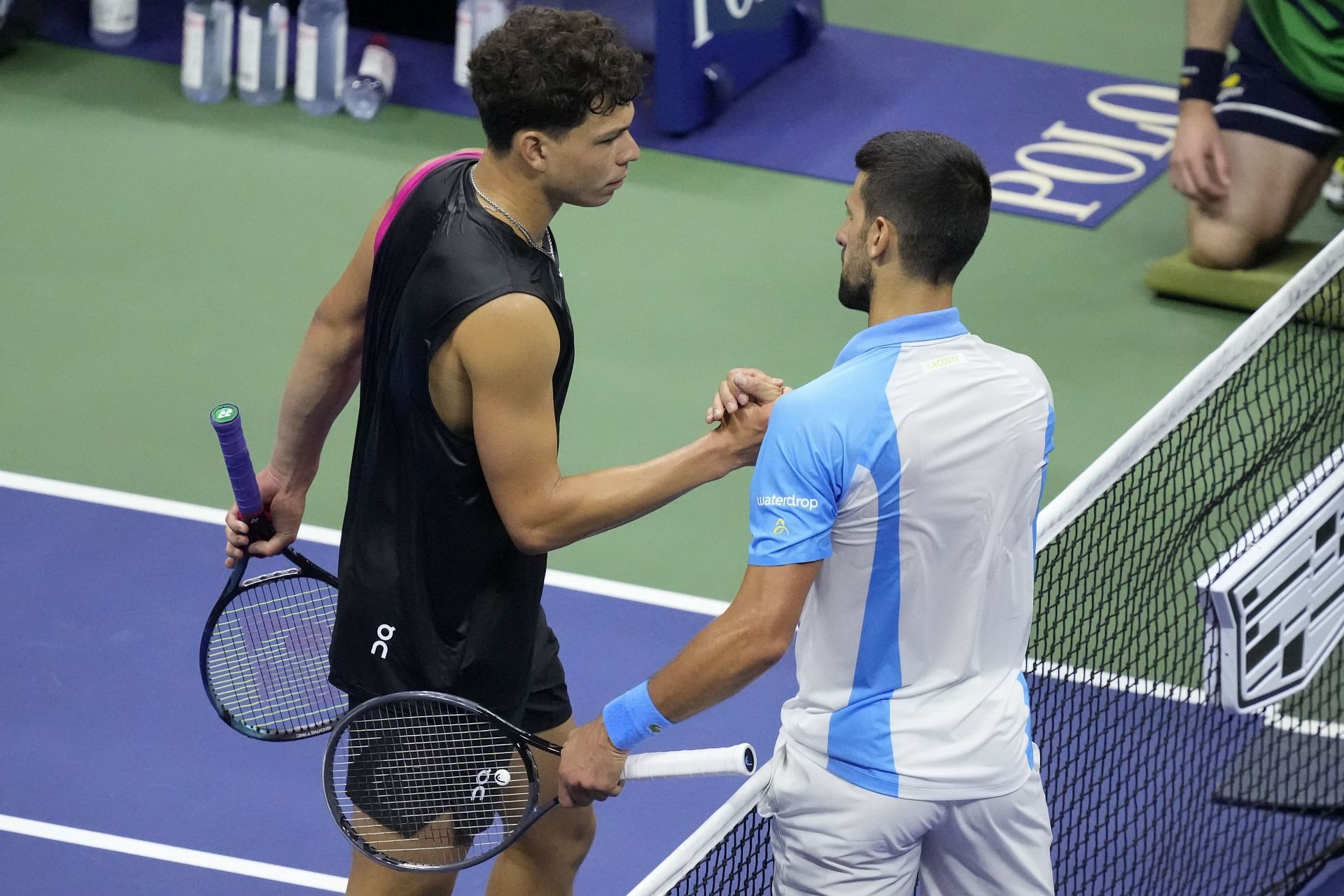 Djokovic and Shelton meet at the net after the US Open semifinal