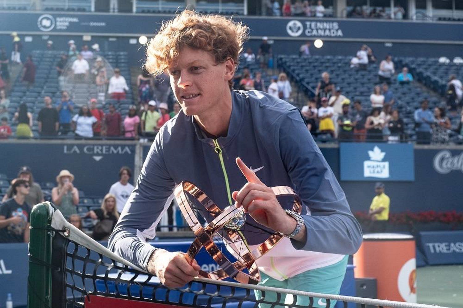 Jannik Sinner poses with the 2023 Canadian Open trophy