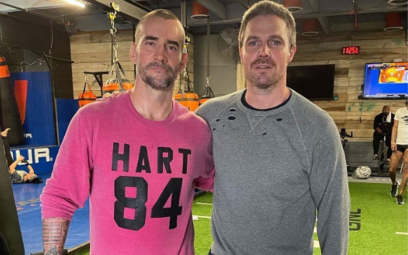 CM Punk and Stephen Amell (left to right)