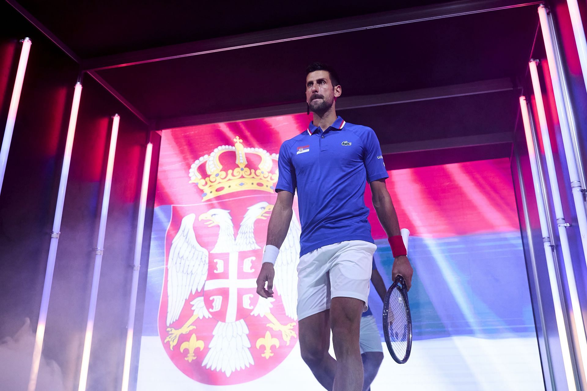 Novak Djokovic walks out on court duirng the Davis Cup Finals