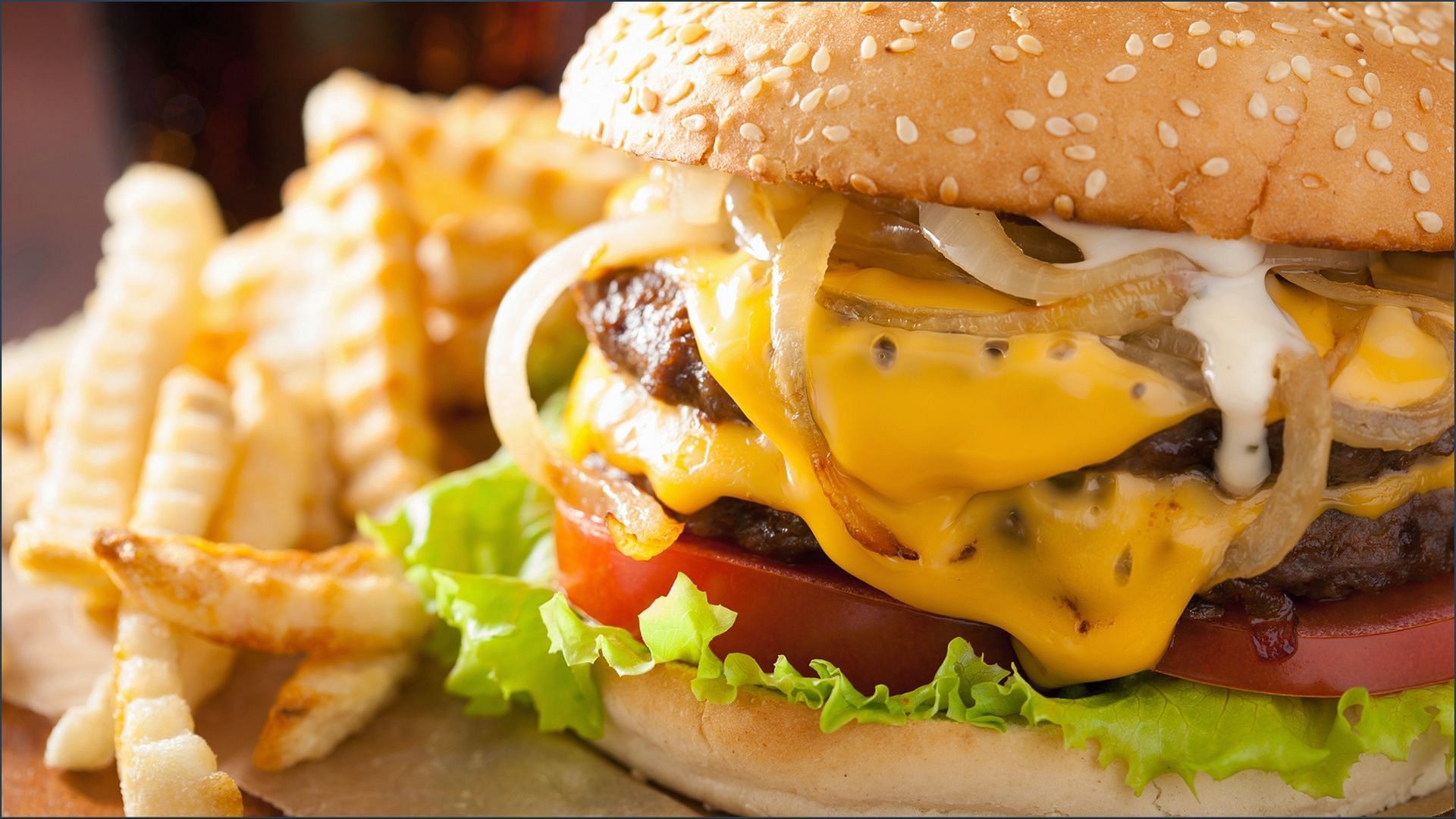 America gets ready to celebrate National Cheeseburger Day with major deals and discounts from popular fast food chains (Image via OlgaMiltsova / Getty Images)