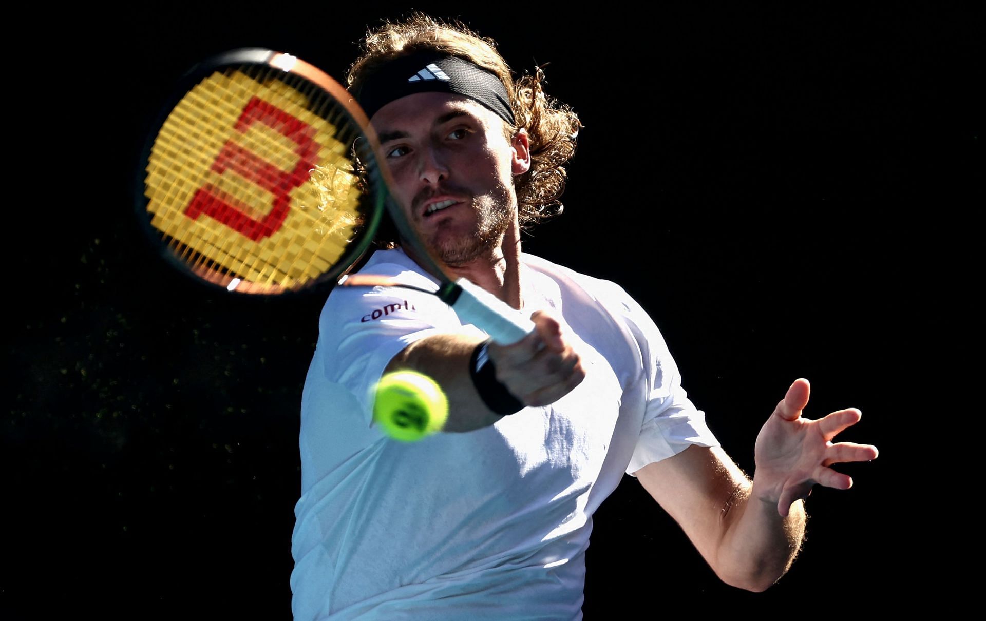 Stefanos Tsitsipas hits a forehand at the 2023 Australian Open