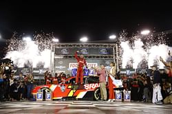 WATCH: Dale Earnhardt Jr. and Justin Allgaier’s father ride the winning NASCAR Xfinity driver’s car to victory lane at Bristol
