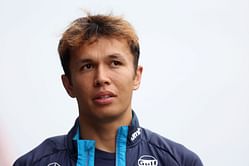 Alex Albon shares his disappointment on team radio after Sergio Perez bumps him in the Singapore Grand Prix