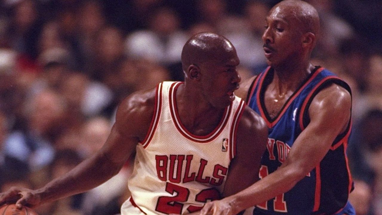 Michael Jordan of the Chicago Bulls against Derek Harper of the New York Knicks.