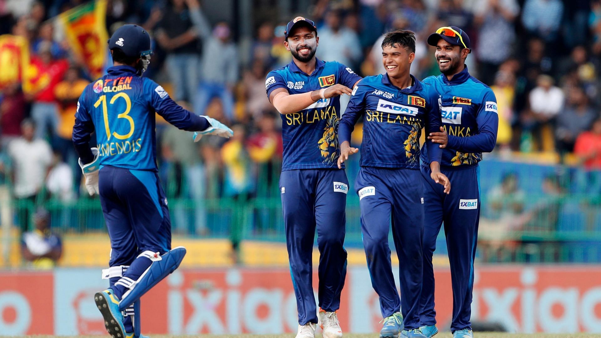 Dunith Wellalage being congratulated by his teammates after he took a wicket during the Supeer4 match against India. 
