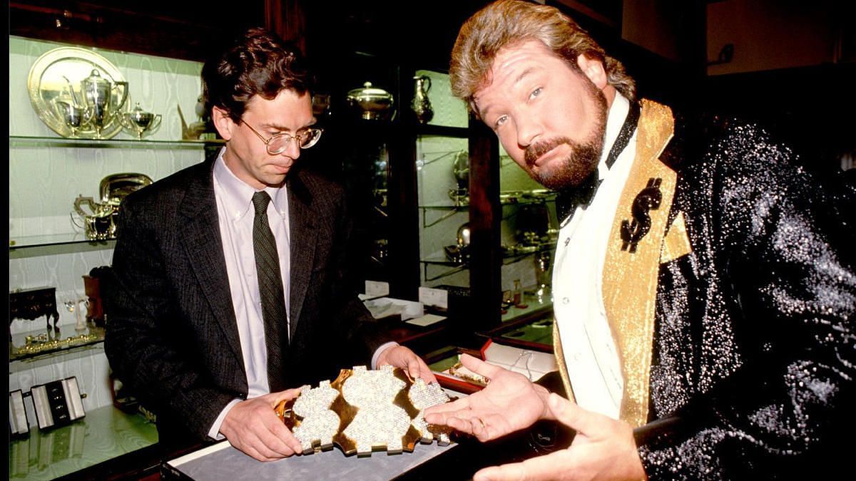 Ted DiBiase Sr. alongside the Million Dollar Championship