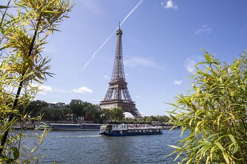 Seine River flowing below the Eiffel Tower