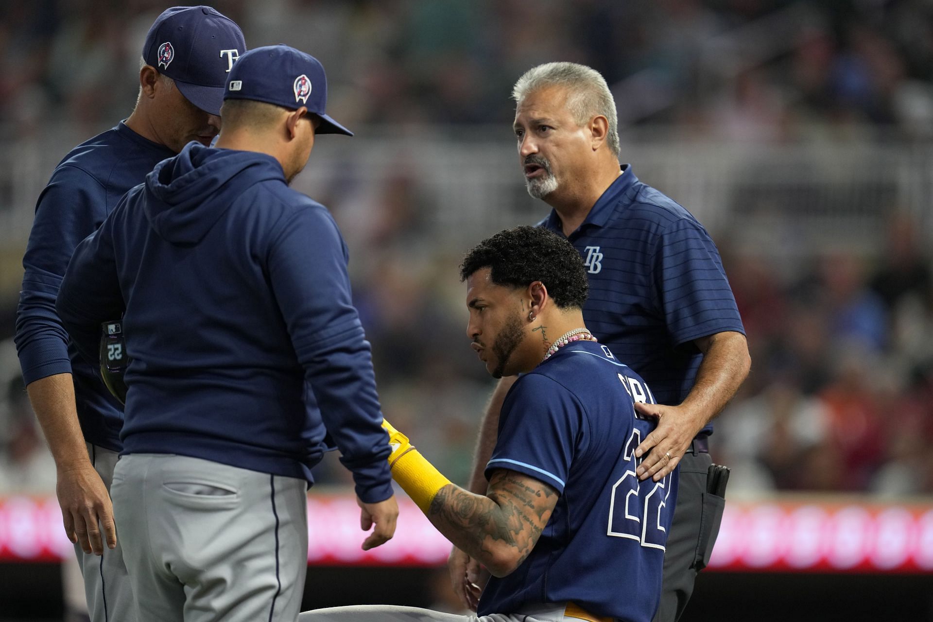 Jose Siri was attended by team staff after being hit by a pitch in the fifth inning.