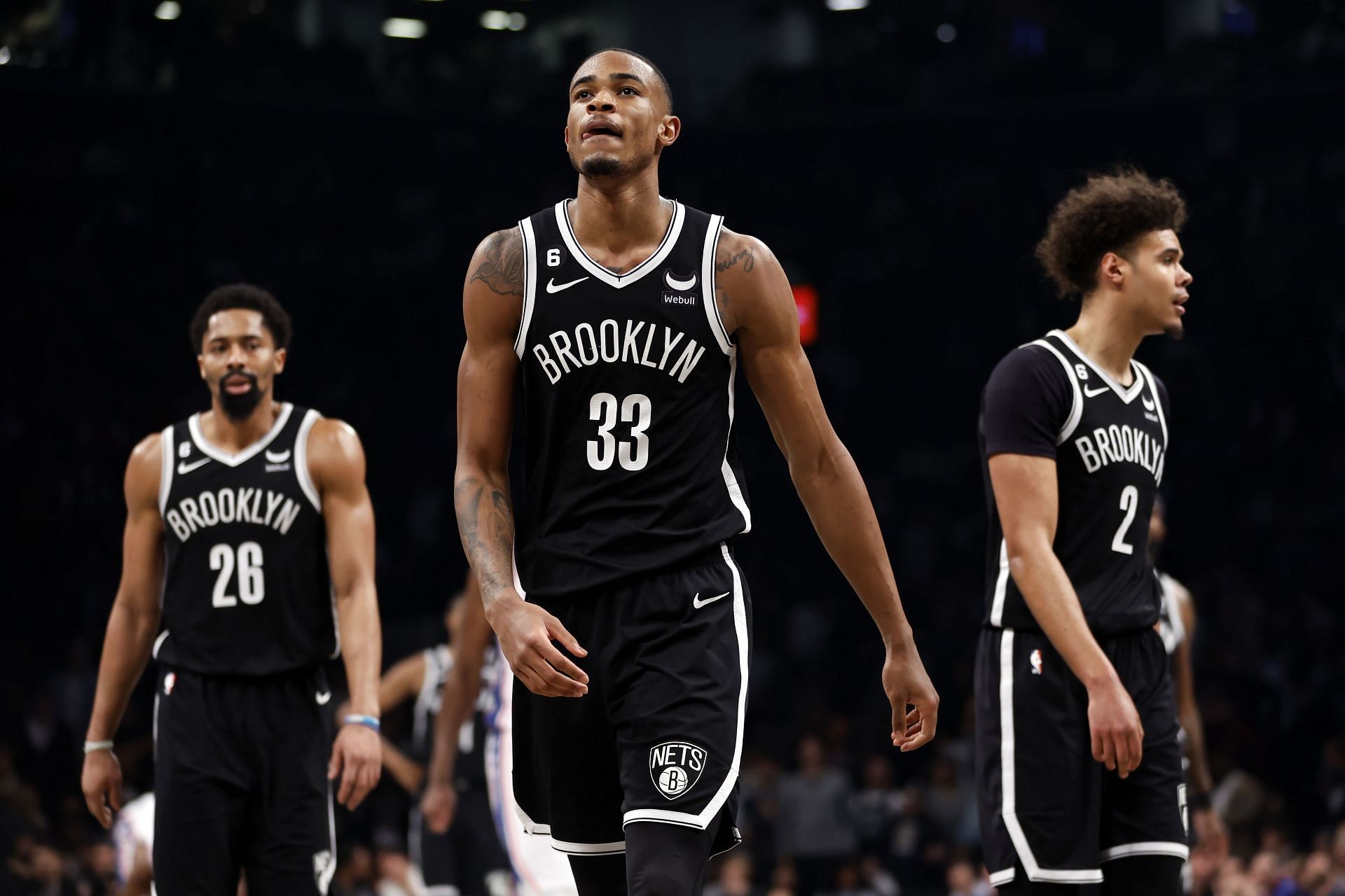 Nic Claxton with Cam Johnson and Spencer Dinwiddie of the Brooklyn Nets