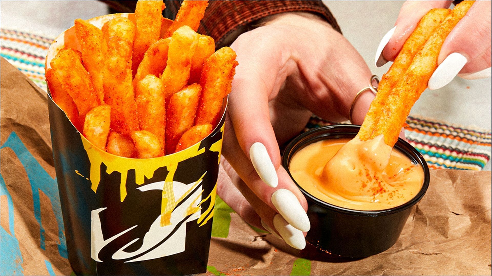 The new Nacho Fries with Vegan Cheese Sauce is certified to be Vegan by the American Vegan Association (Image via T. Bell)