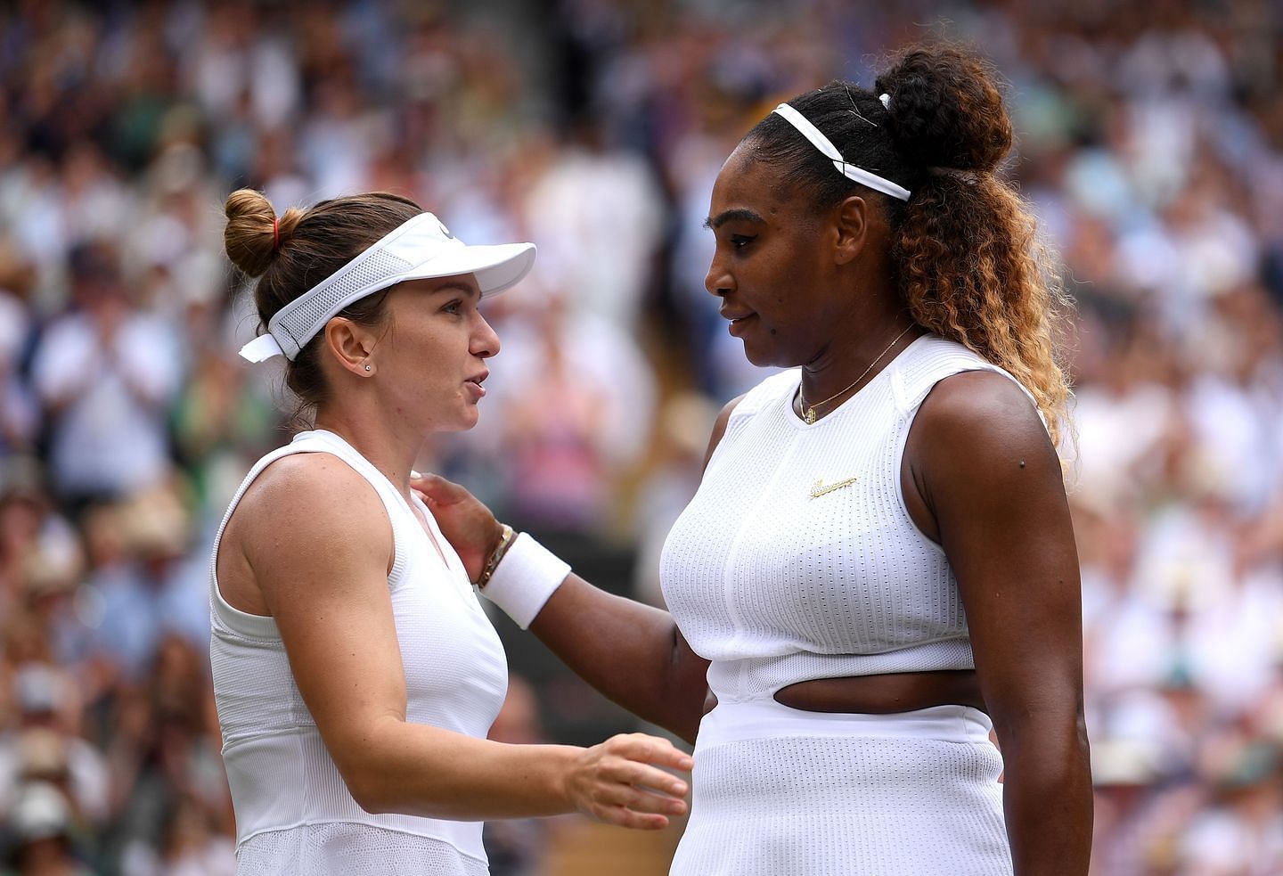 Serena Williams and Simona Halep embrace each other after the 2019 Wimbledon final