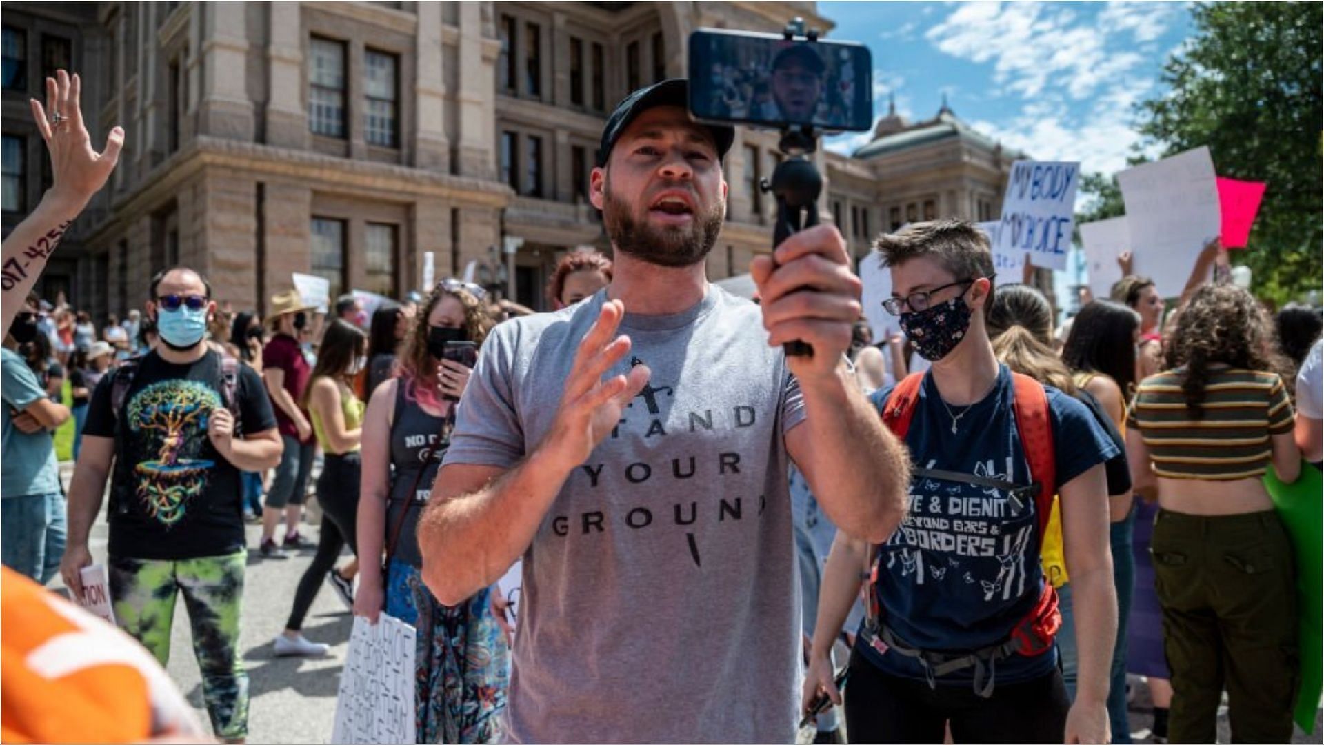 Four misdemeanor charges were imposed on Owen Shroyer (Image via Sergio Flores/Getty Images)